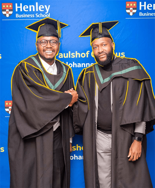 Graduates shaking hands